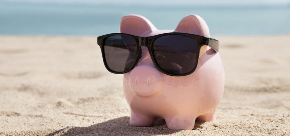 piggy bank on a beach | ROI of TCT Portal vs. Excel