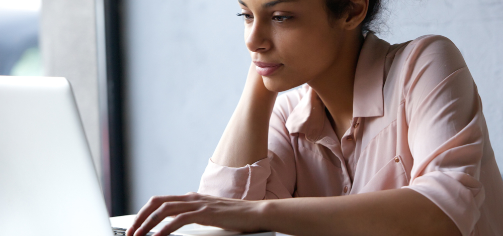 compliance assessor watching webinar