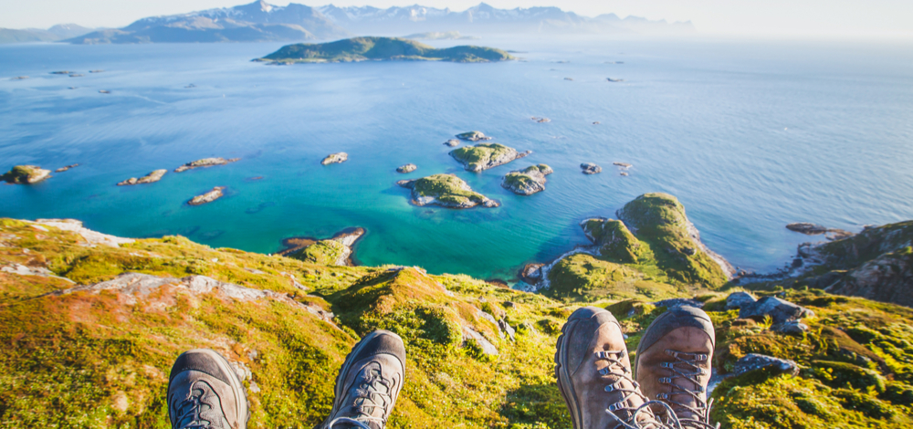 feet of hikers relaxing on top of a mountain | more successful and efficient PCI engagements