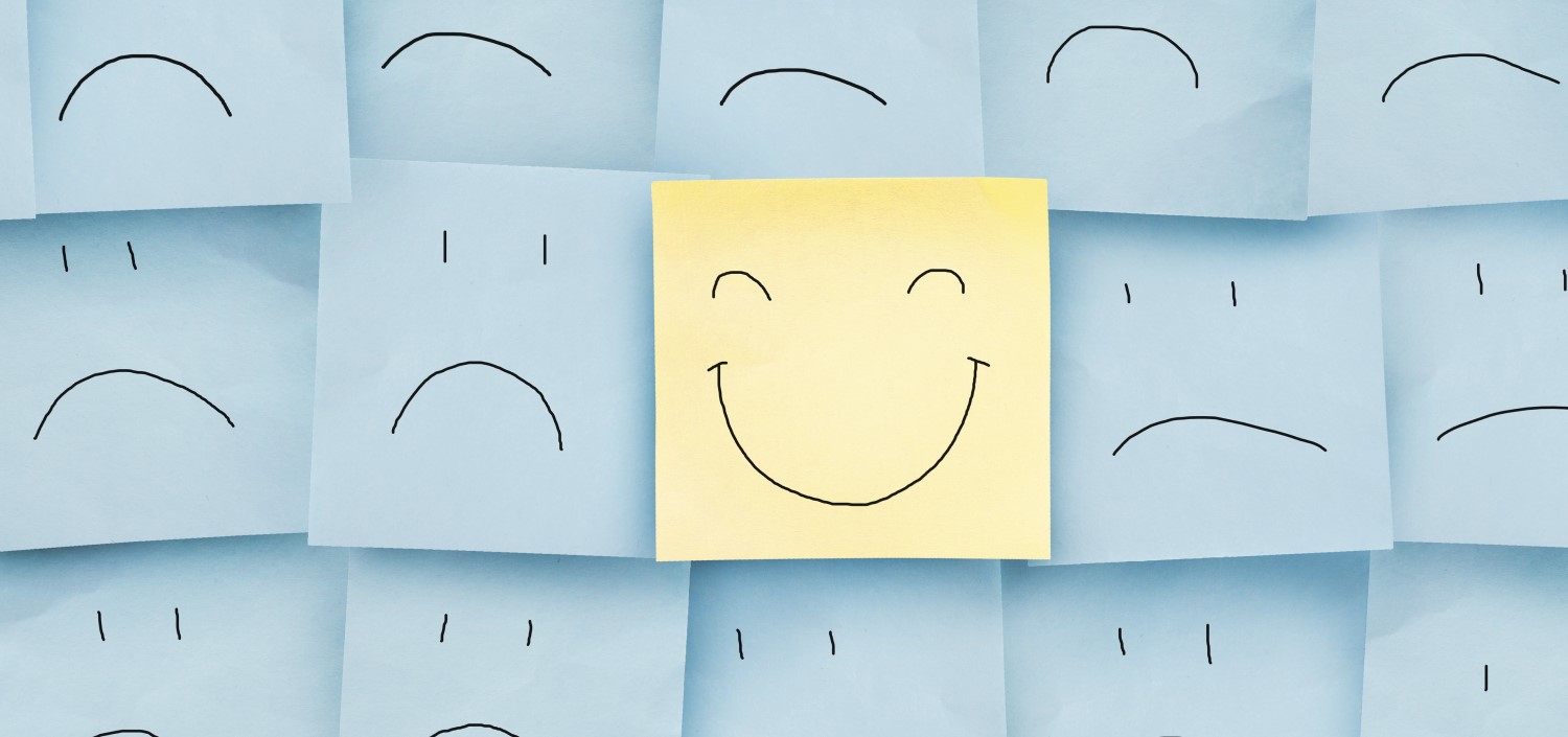 happy and sad faces on post-it notes | change management program
