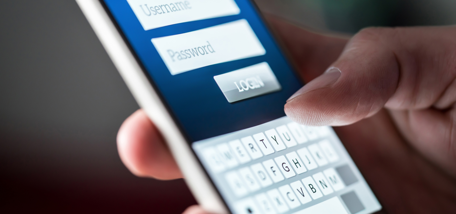 User entering a password in their phone | compliance and security insights for passwords