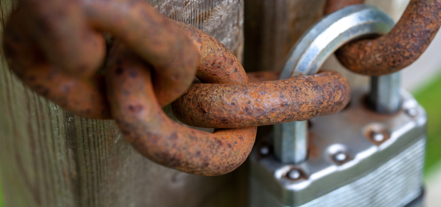 closeup of a padlock | compliance unfiltered podcast: firewalls