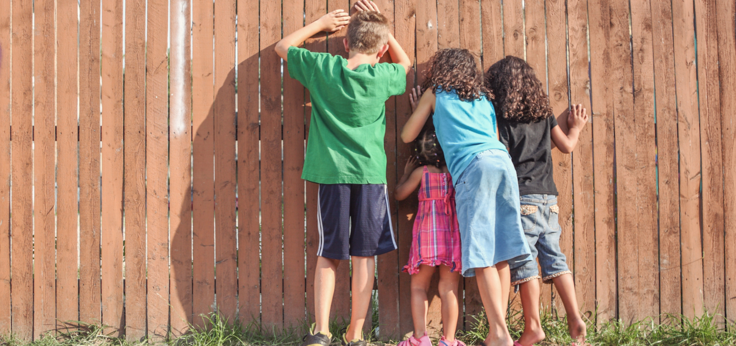 kids peeking through a fence | Compliance Unfiltered podcast: SOC 2