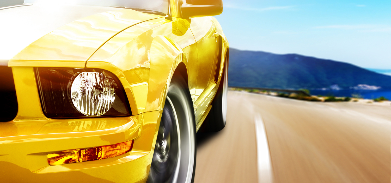 Closeup of a yellow sports car speeding on the highway | generate a report on compliance fast