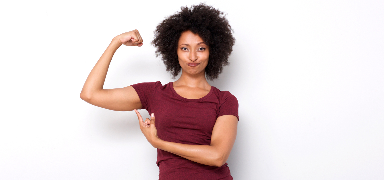 woman flexing her muscles | keep your compliance team accountable