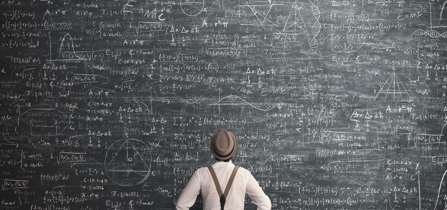 man staring at overwhelming mathematical equation on a blackboard | TCT Portal flattens the learning curve of PCI DSS 4.0