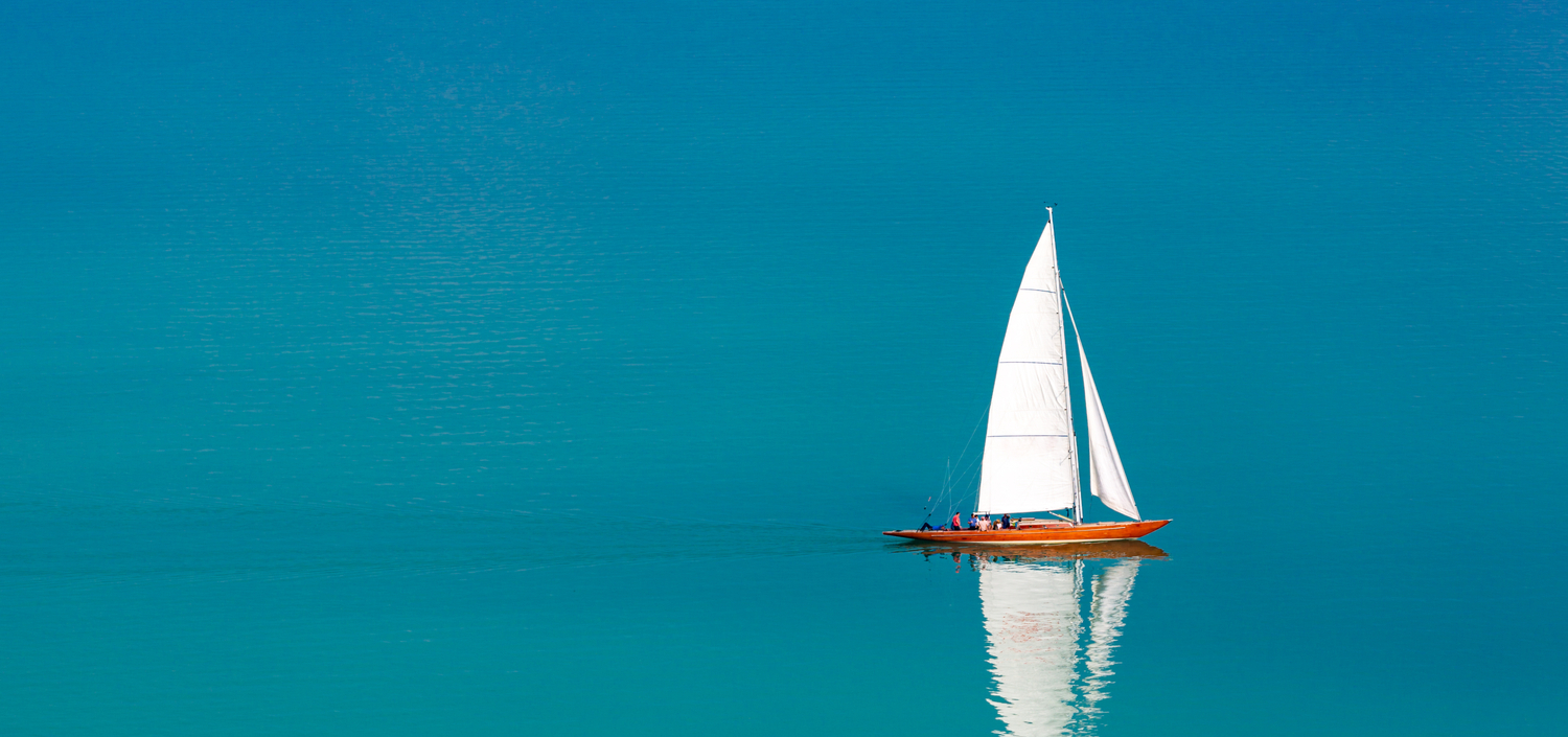 sailboat on calm waters | compliance management during employee turnover