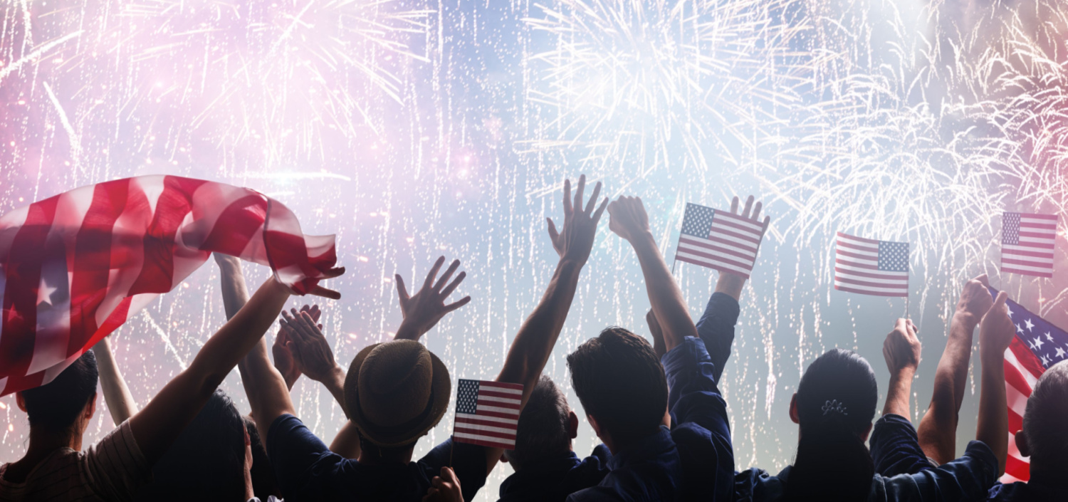 Silhouettes of people holding the American flag with fireworks. Compliance Independence Day.