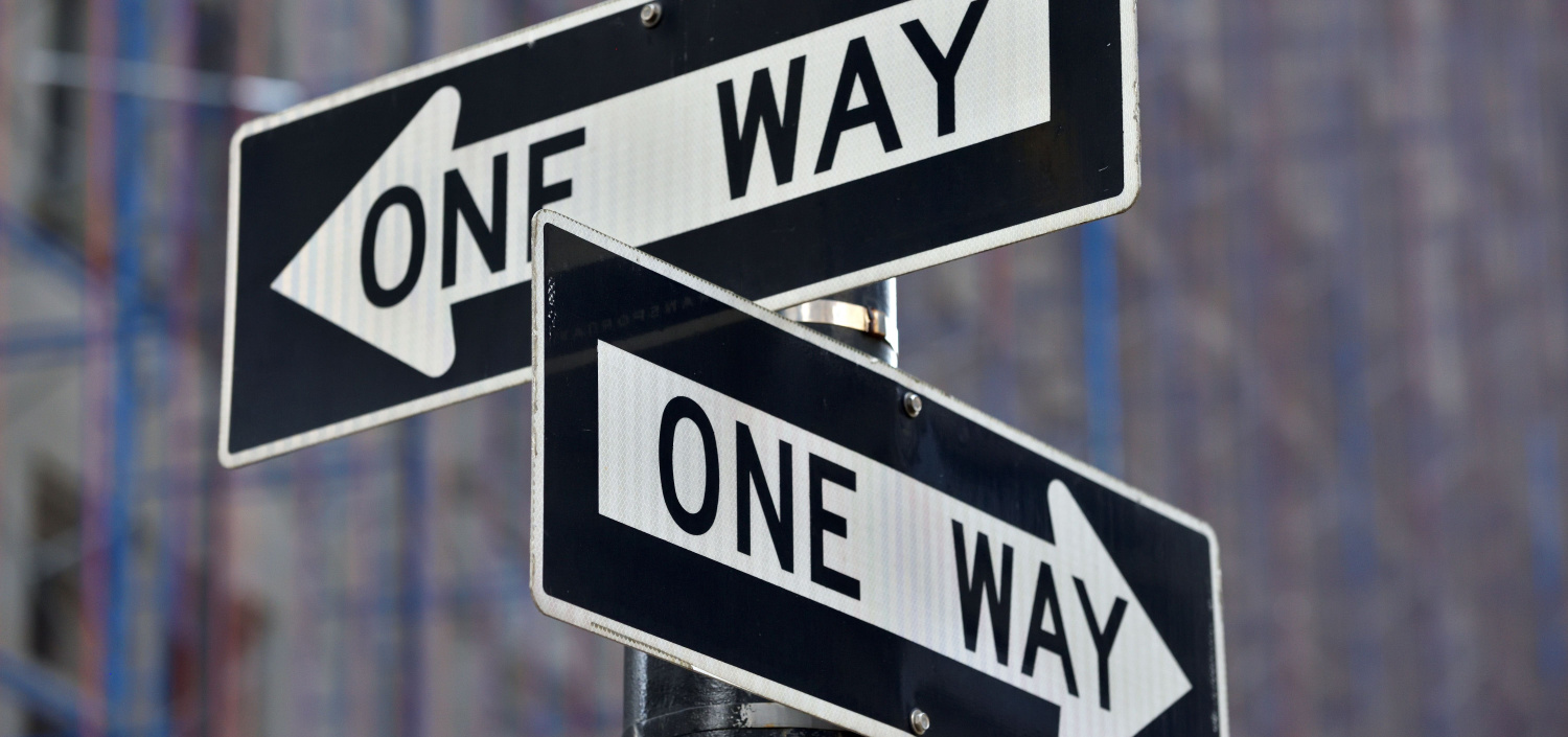 two one-way signs pointed in different directions | SOC 2 certification