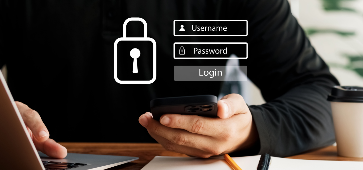 computer user logging in with a password management system | Quick Compliance & Security Insights