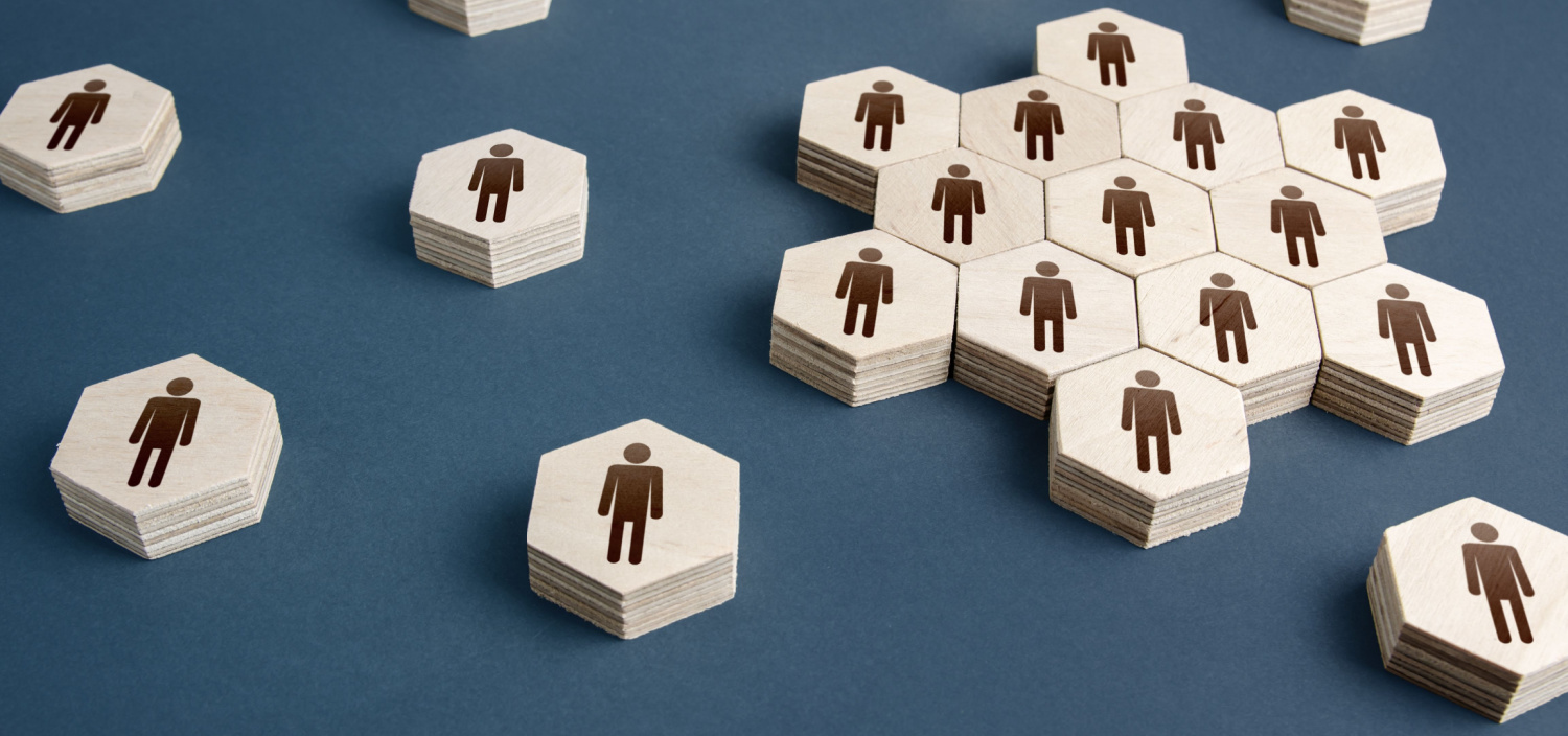 concept of people leaving a company, using wood blocks with icons | reduce security headcount