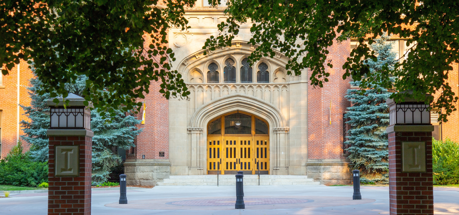 university building | How Higher Ed Institutions Can Streamline Compliance Management