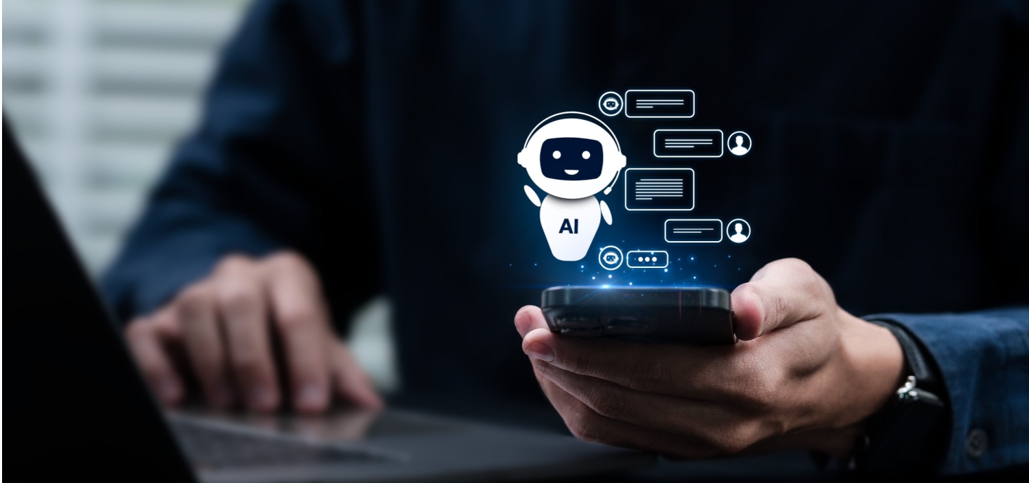 businessman using an AI chatbot on his phone at work | how to draft an AI policy