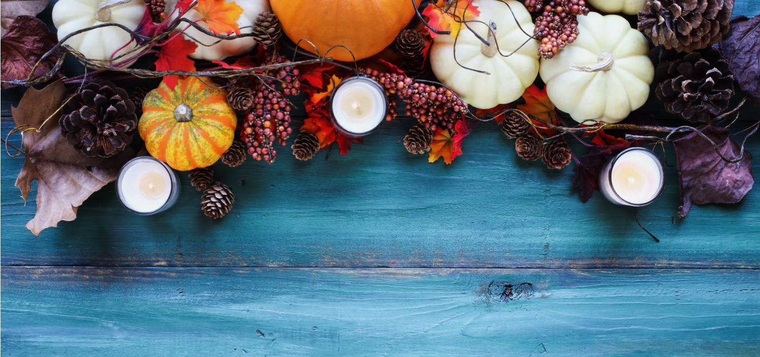 Thanksgiving themed decorations against a blue background