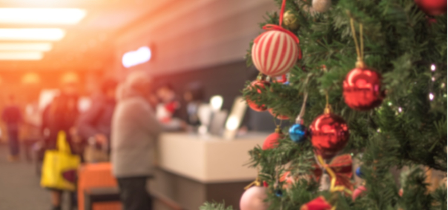 crowded hotel lobby during Christmas | Holiday Season Puts Hotels at Risk of a Data Breach