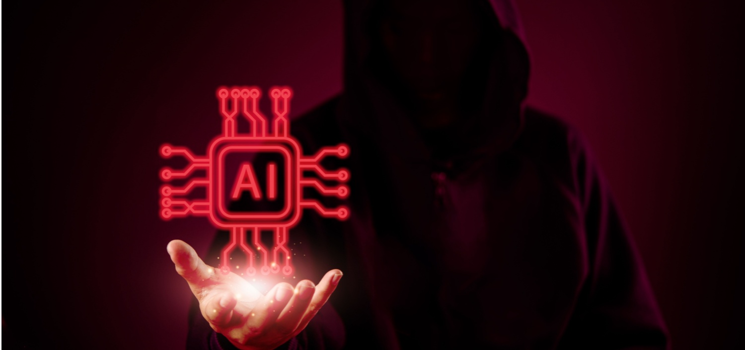 hacker in a hoodie with an AI symbol to show security risks of AI adoption